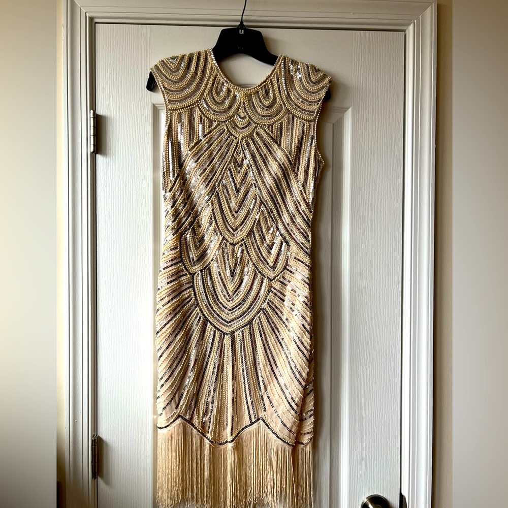 Beige Cocktail dress with fringe hemline